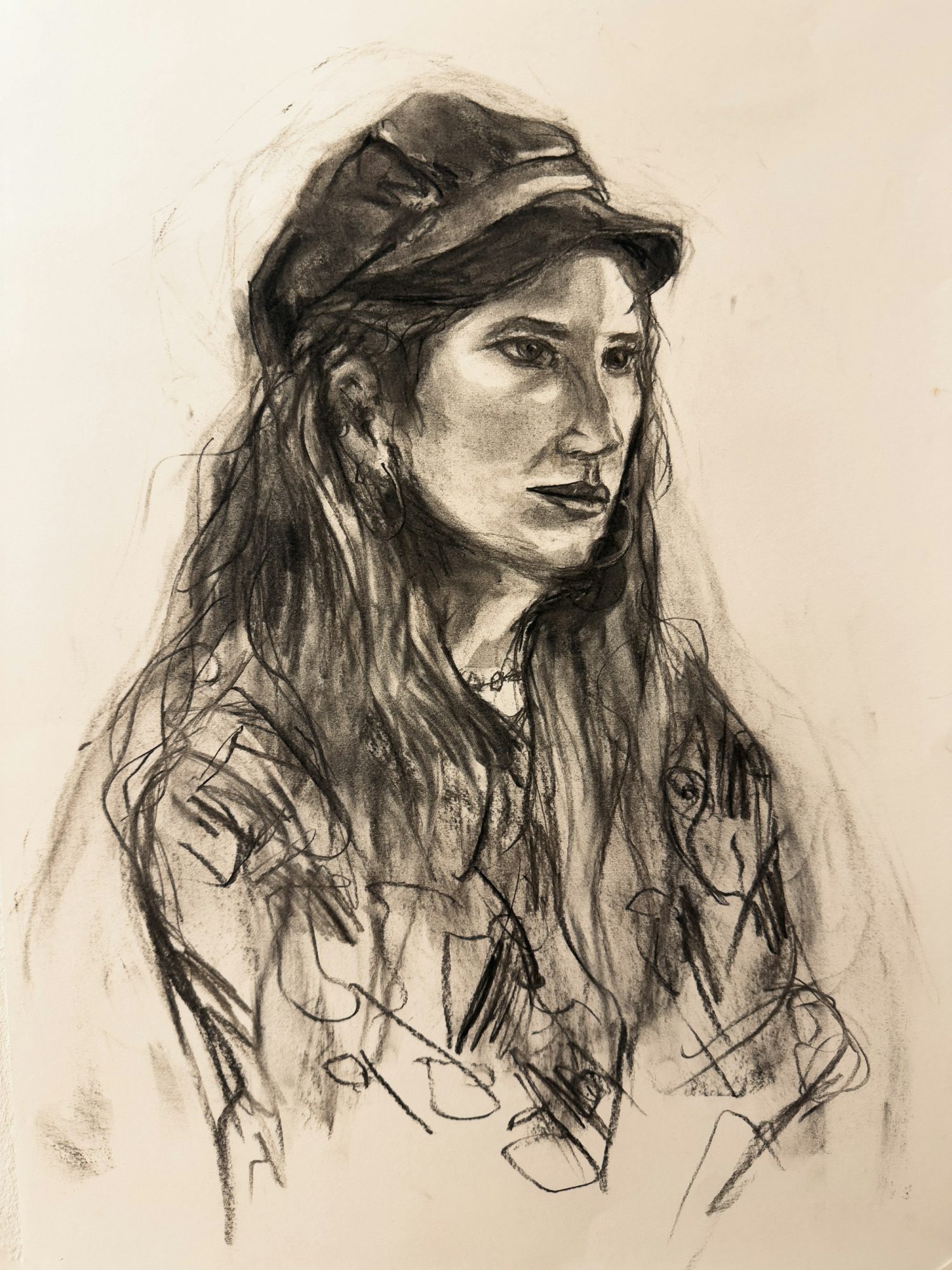 Femme à la casquette — Fusain